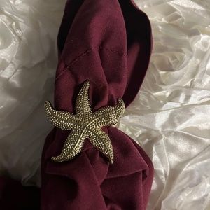 Gold starfish napkin rings